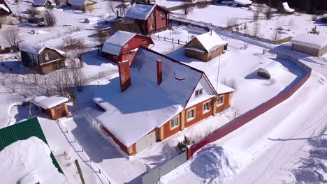 snowy village aerial view in winter