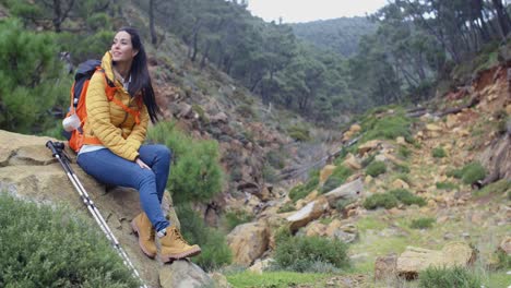 young backpacker relaxing to enjoy the view