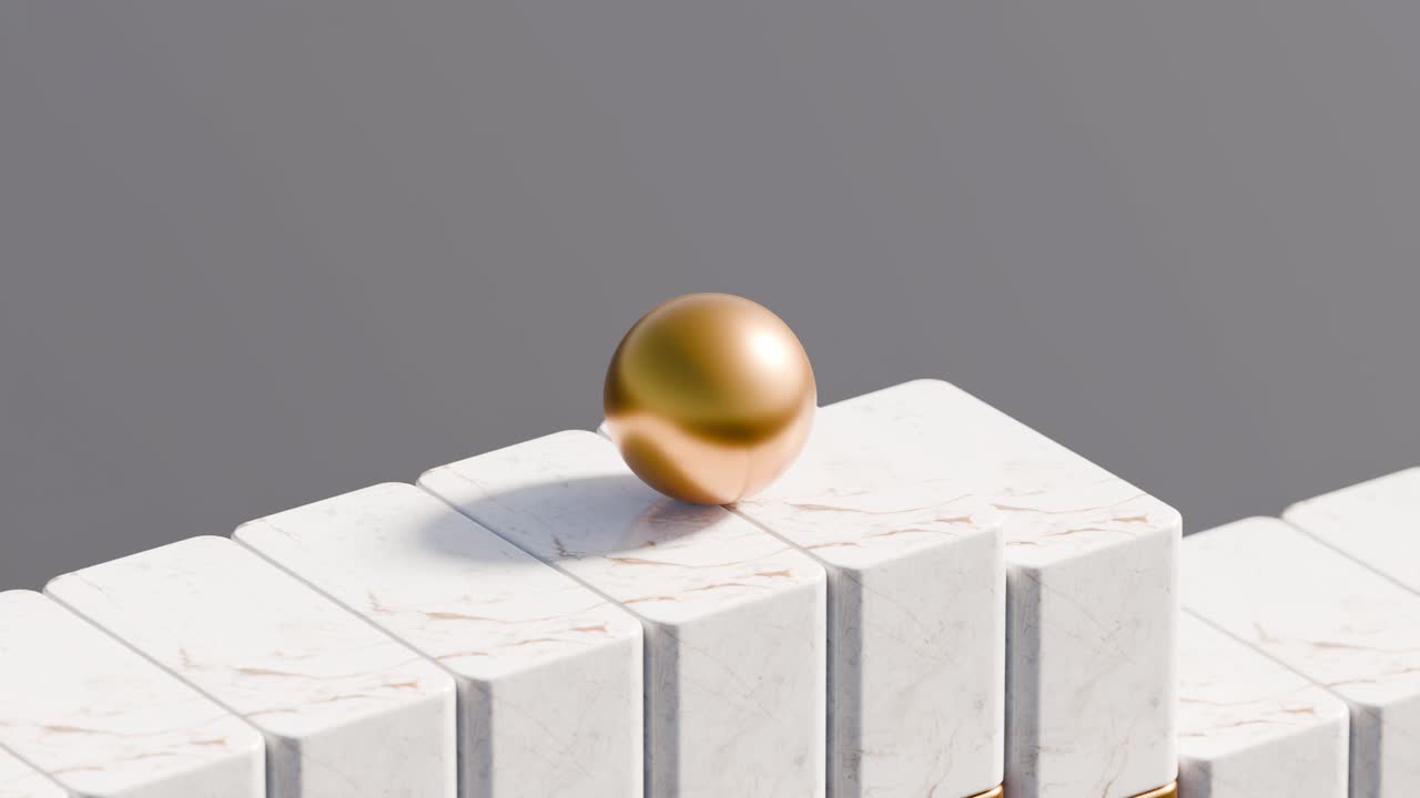 Golden sphere on marble blocks