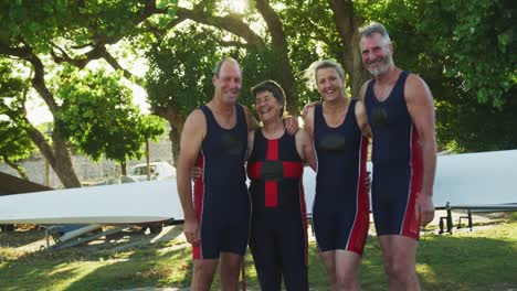 portrait of a rowing team of four senior caucasian men and women