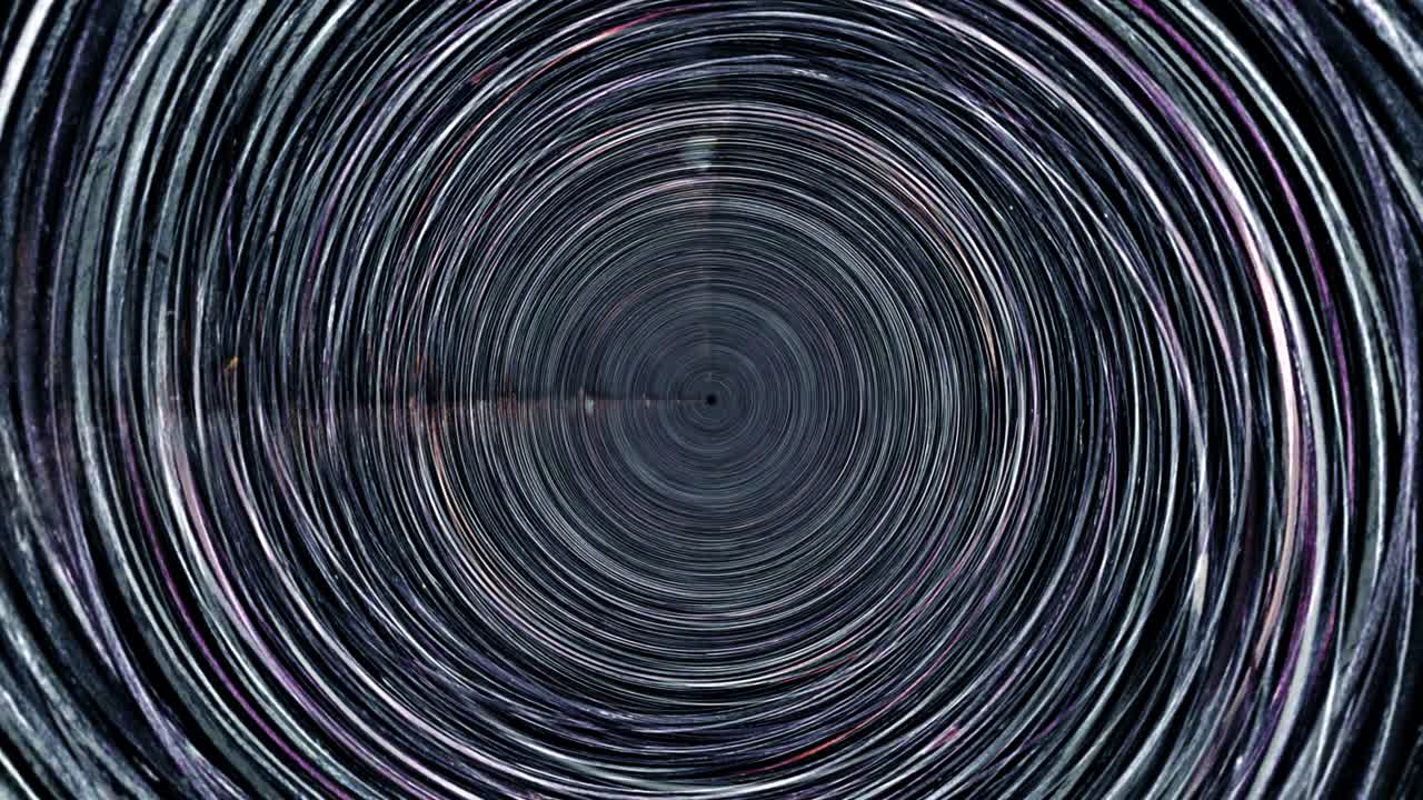 Abstract motion  grunge circle psychedelic twisting in tunnel background multicolored helix vortex light. 4K loop pattern dark round striped swirling hypnotic rotating abstraction