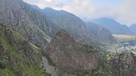 A-dramatic-view-of-a-rocky-mountain-range-with-steep-cliffs-and-rugged-terrain