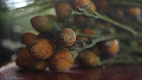 Zoom-in,-close-up-shot-of-areca-fruit-on-the-table