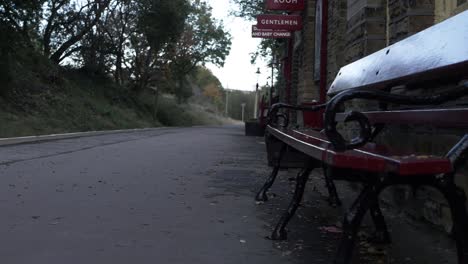 empty vintage train station platform in yorkshire wide panning shot