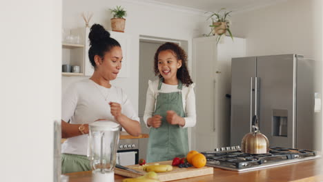 Dance,-happy-or-mother-and-child-in-kitchen