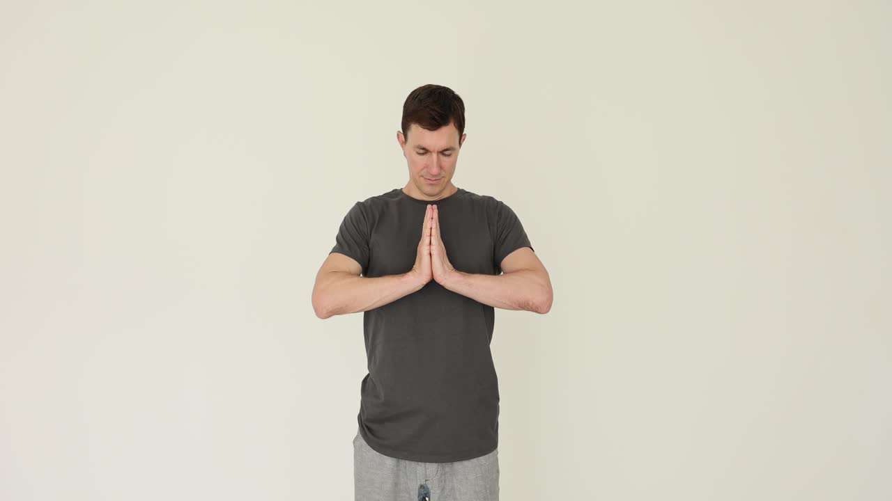 Man demonstrating various hand gestures for spirituality and stopping