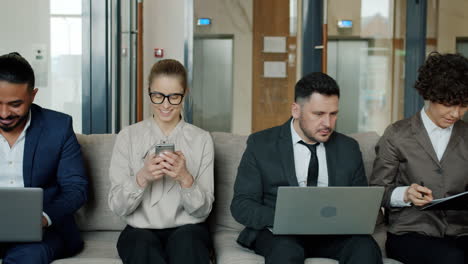 business people waiting in office