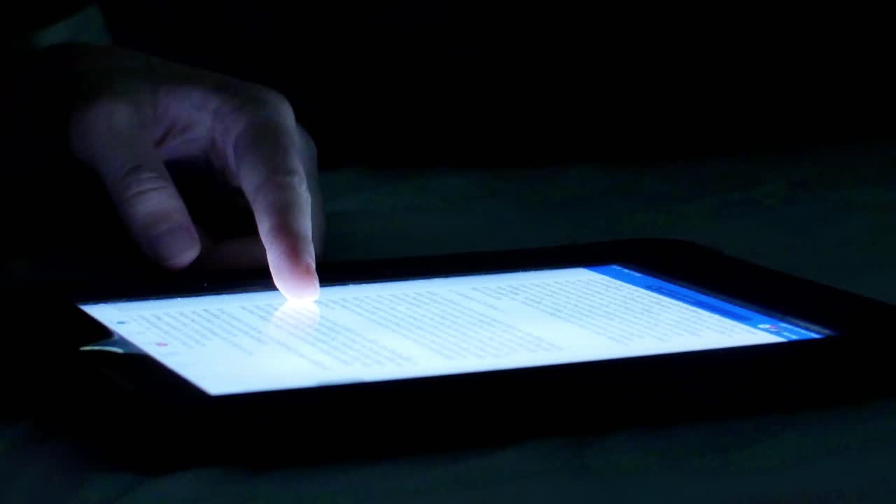 POV to a smartphone-tablet while being touched, young woman using mobile phone-tablet