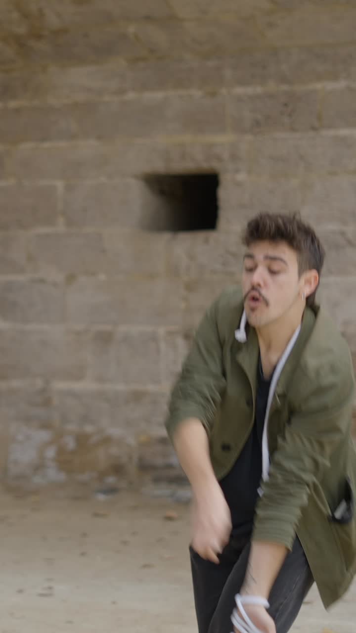 Man Demonstrates Rope Manipulation or Trick