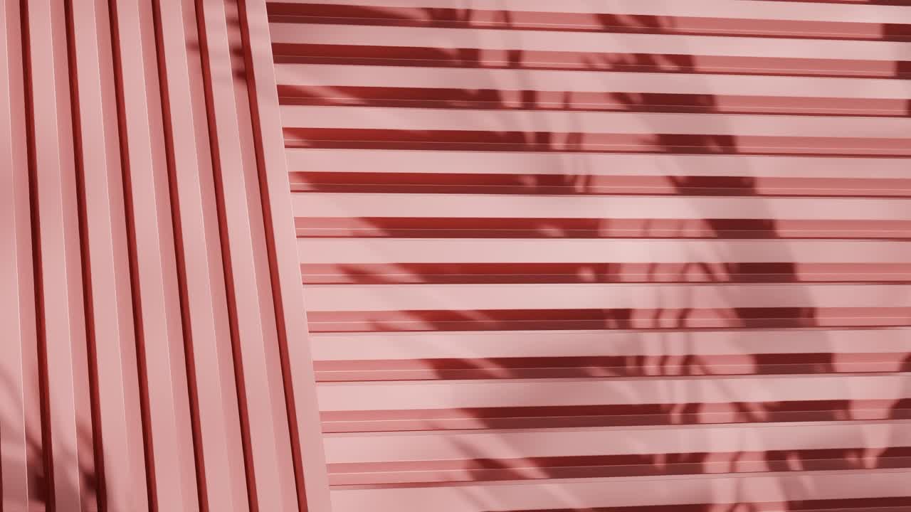 red vertical metal panels with shadows of tropical leaves. Abstract architectural detail. Close-up photography with copy space for design and print