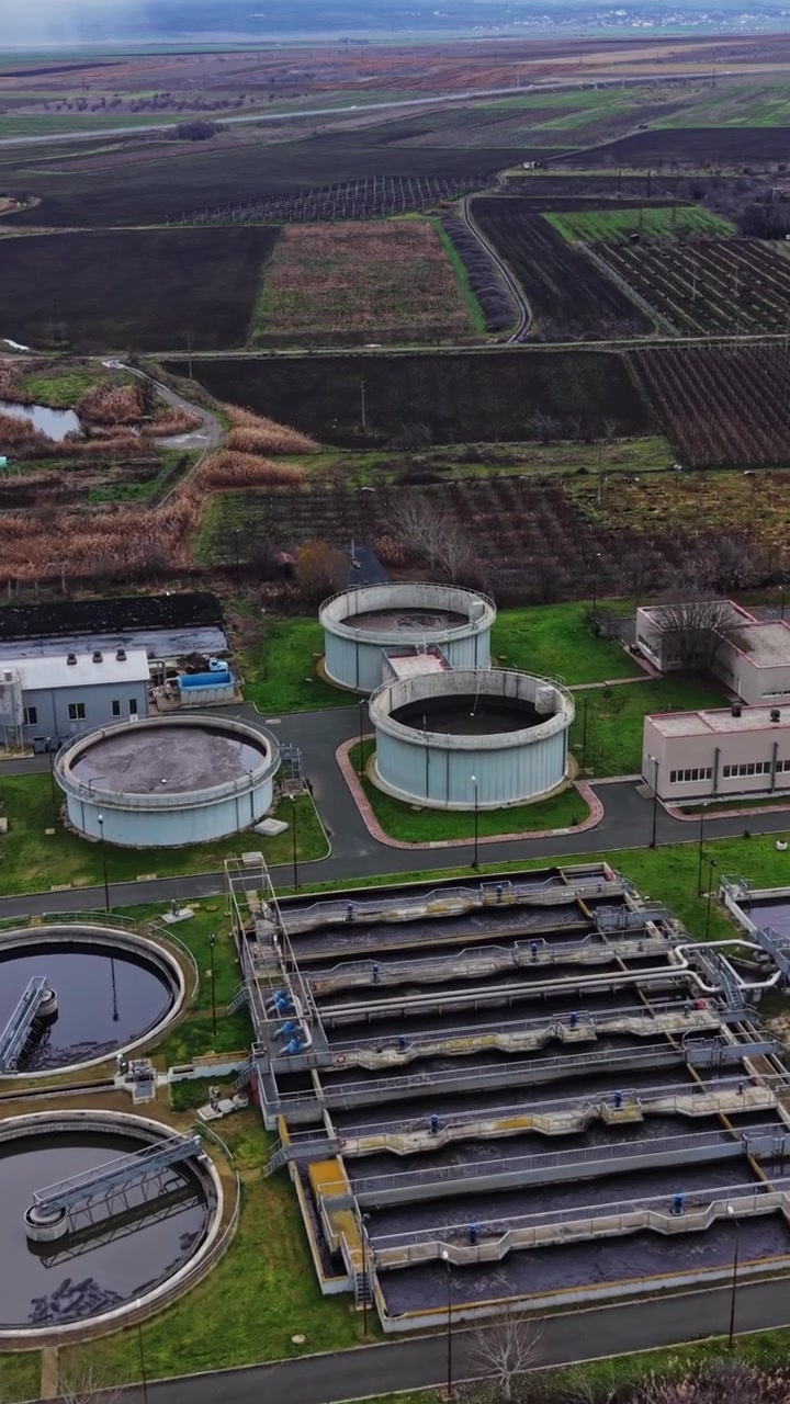 Treatment plant processes water near fields and a pond in rural area
