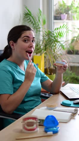 dentist showing dental impression model
