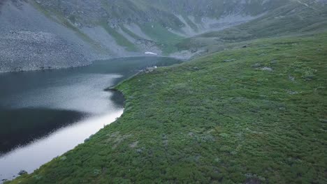 aerial view of mountain lake with people