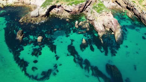 craggy landscape of ponta da piedade headland in lagos, portugal. aerial shot