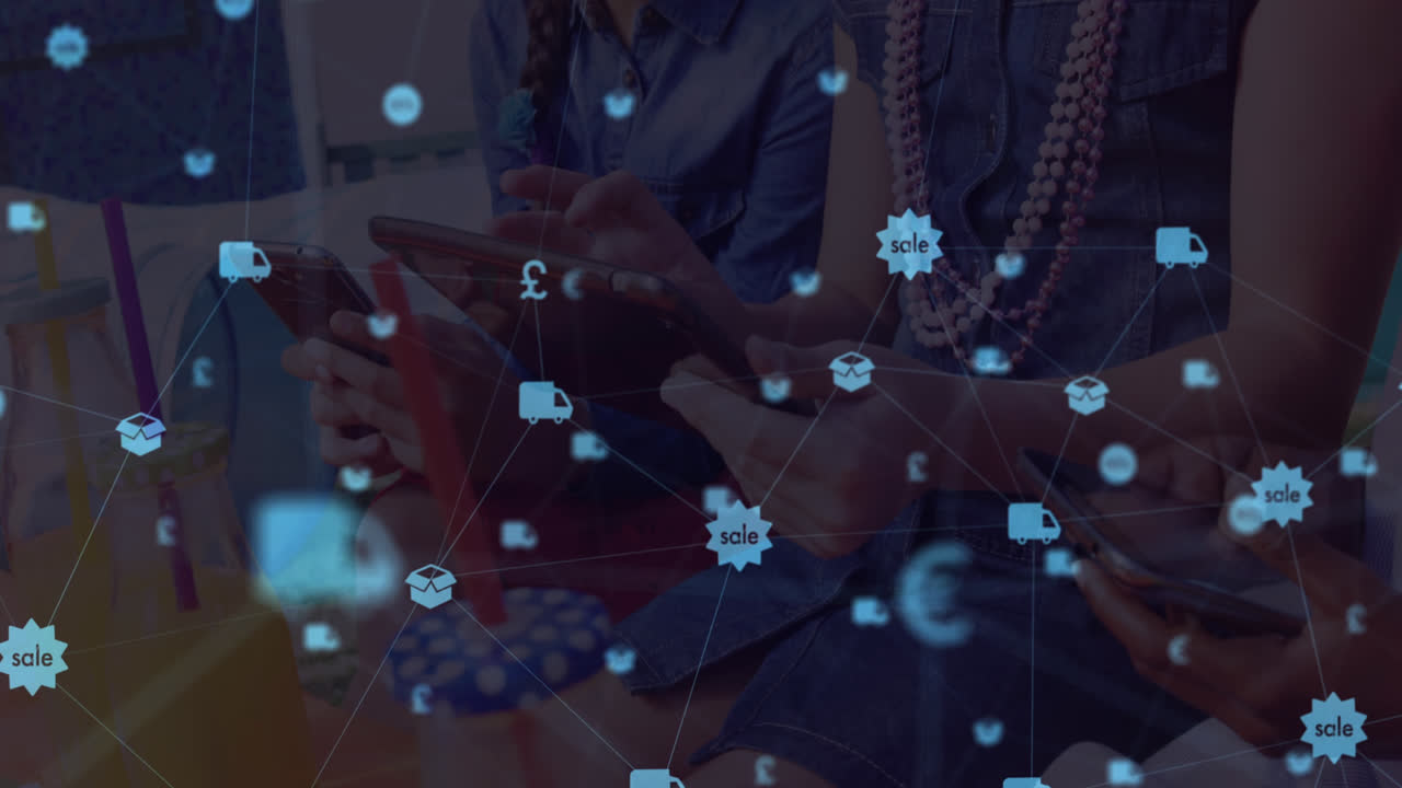 Digital composite video of web of connections with icons moving against people using digital tablets