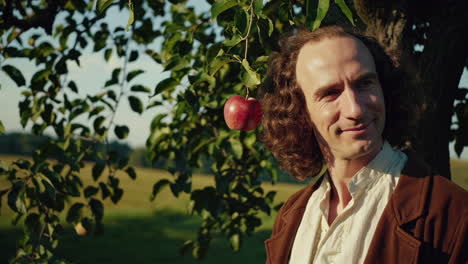 man under an apple tree