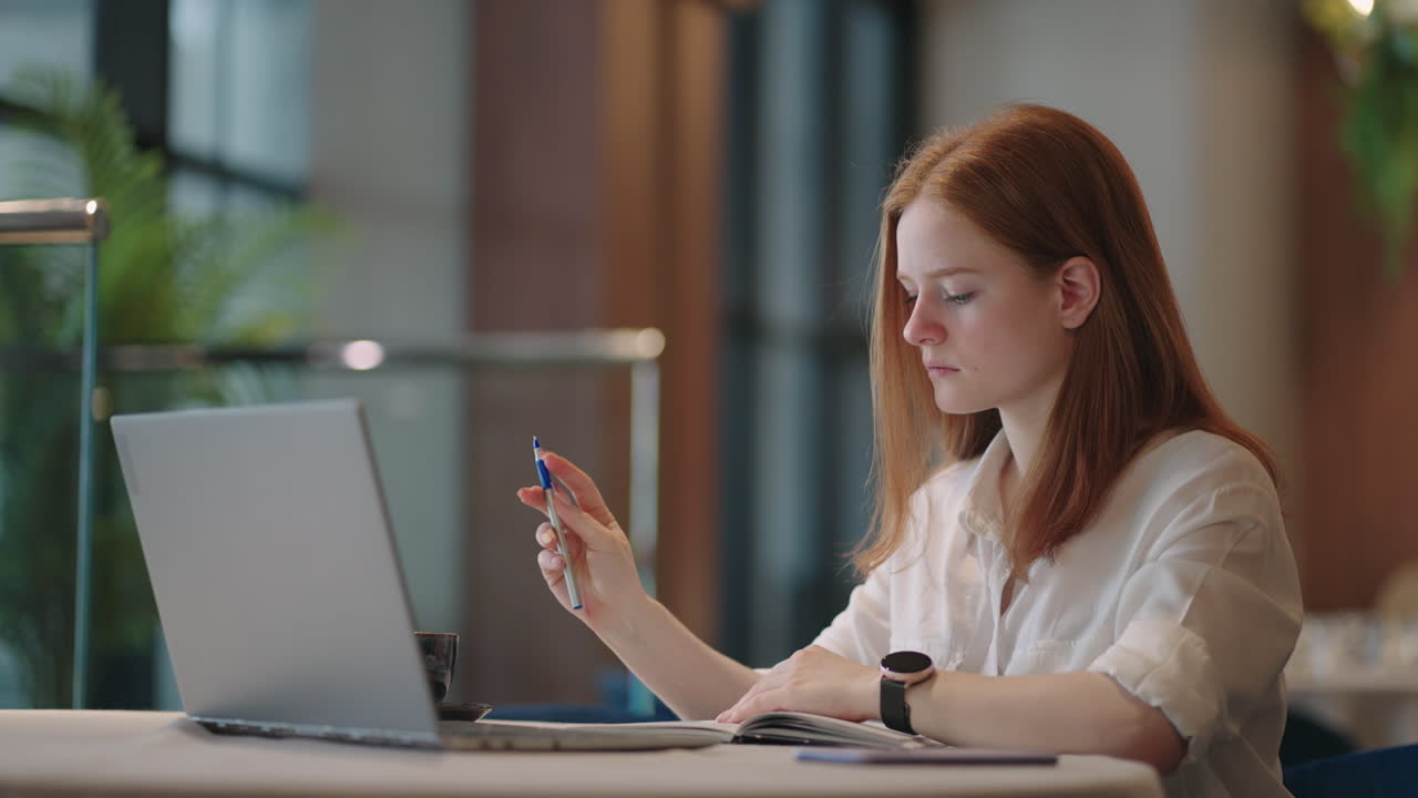 seo specialist or journalist is working with laptop in home or in modern office young woman is working remotely