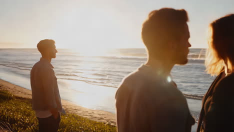 friends at the beach sunset