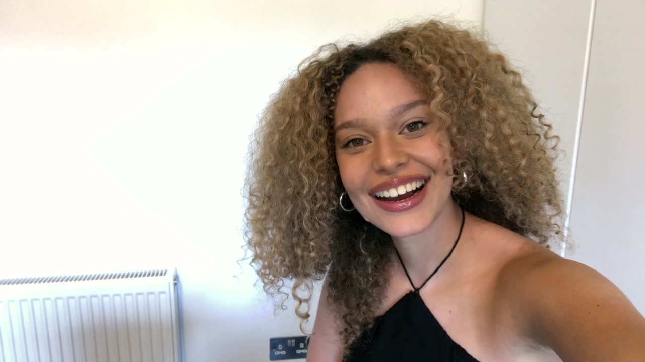 Woman Listening And Responding To A Video Chat