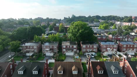 aerial rising reveal shot of small town america in fall