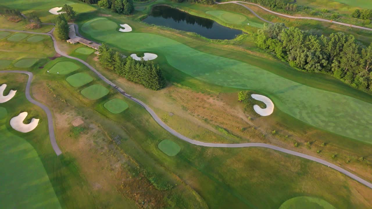 Aerial view of lush golf course at Osprey Valley on a sunny day