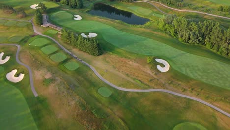 aerial view of lush golf course at osprey valley on a sunny day