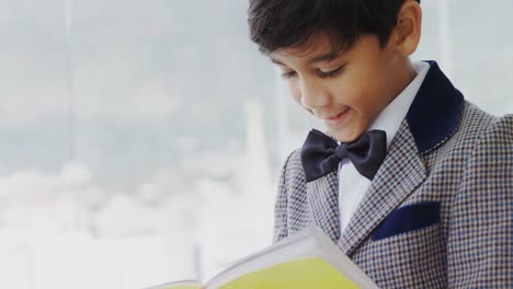 kid as businessman writing on diary 4k