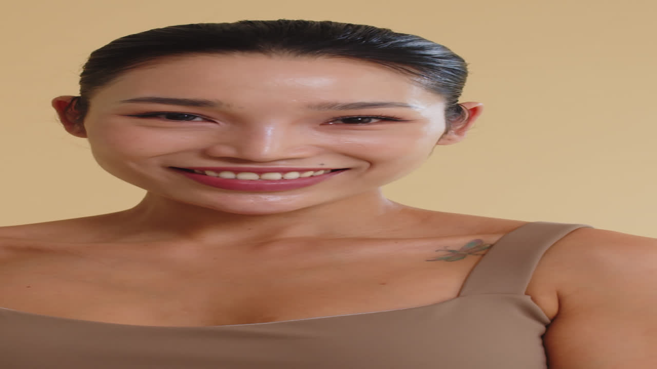 Portrait of Cheerful Sportswoman in Beige Activewear