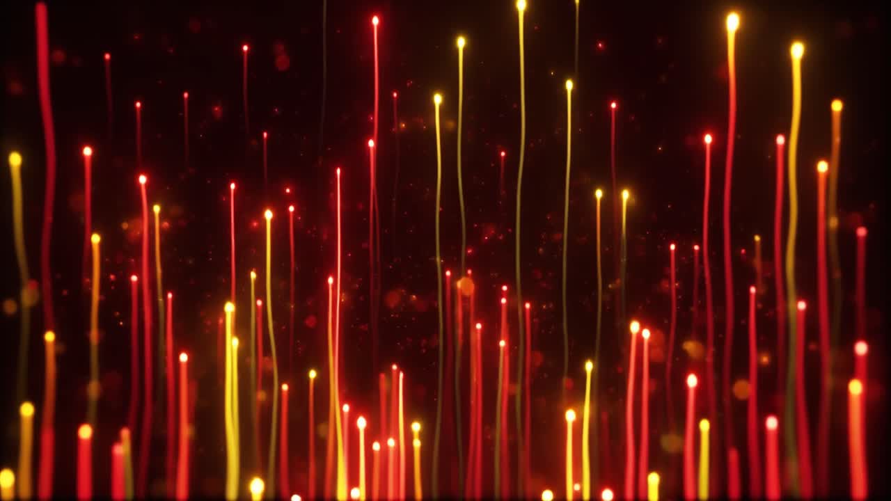 Glowing Red and Yellow Light Trails Rising on Dark Background