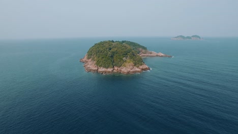 aerial shot of tropical island with crystal clear sea