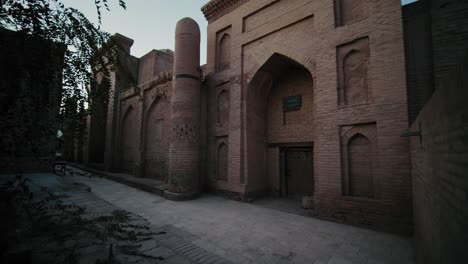 khiva ichan kala fortress main entrance to old madrassah evening time, uzbekistan old city 2