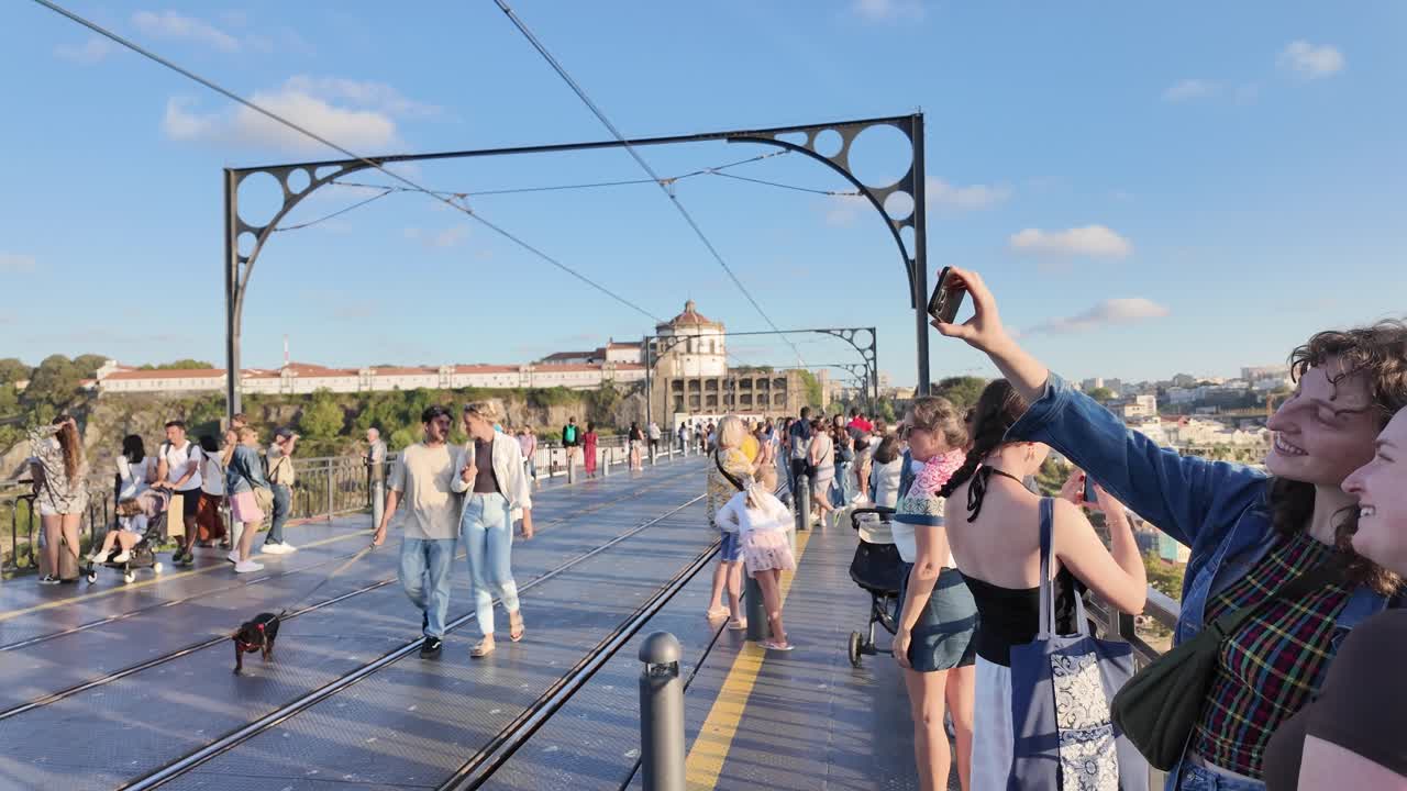 Porto city and boats along the douro river during sunset, aerial view