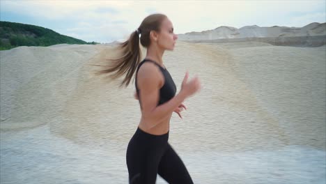 woman running in a quarry