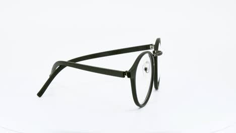 eyeglasses on white background, black glasses round motion round degree rotation.