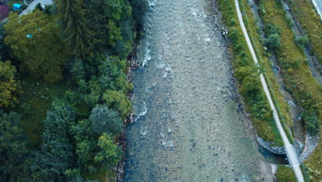 aerial top view of a bavarian cascading river, germany