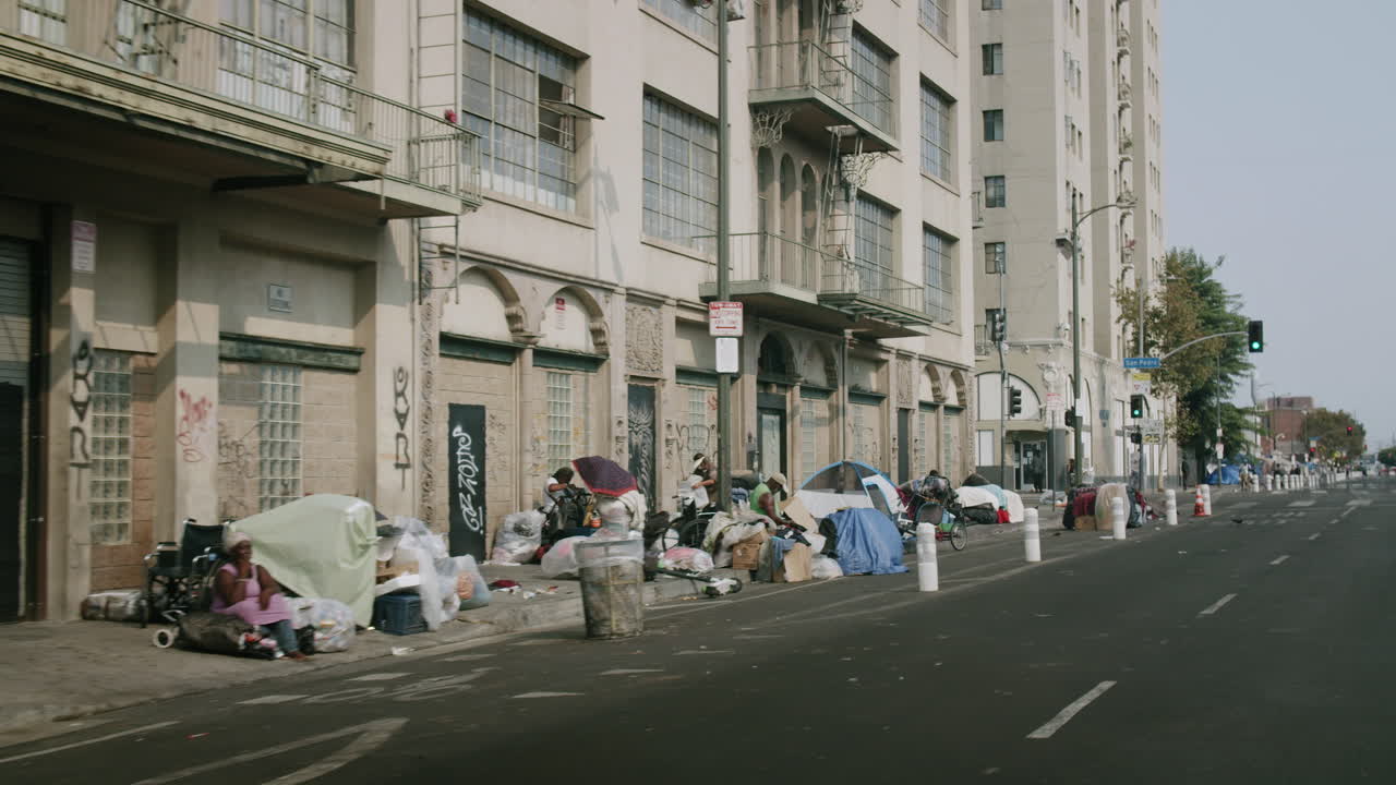 Homeless encampment along San Pedro Street in an urban area