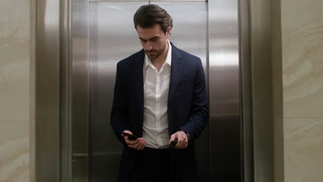 man exiting the elevator at the hotel