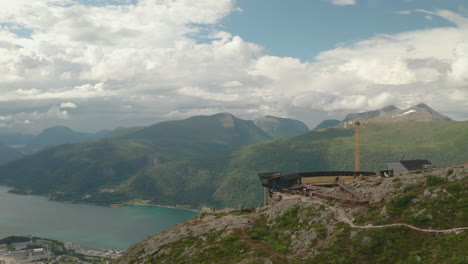 Aerial-View-Of-Eggen-Restaurant-Overlooking-Romsdalsfjorden-With-Mountain-Views-In-Andalsnes,-Norway