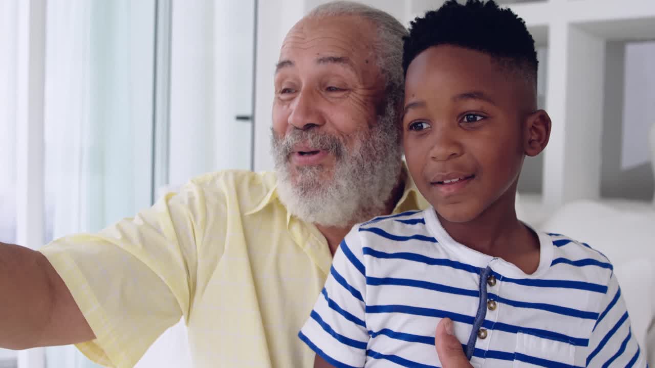 Mature man enjoying time with his grandson