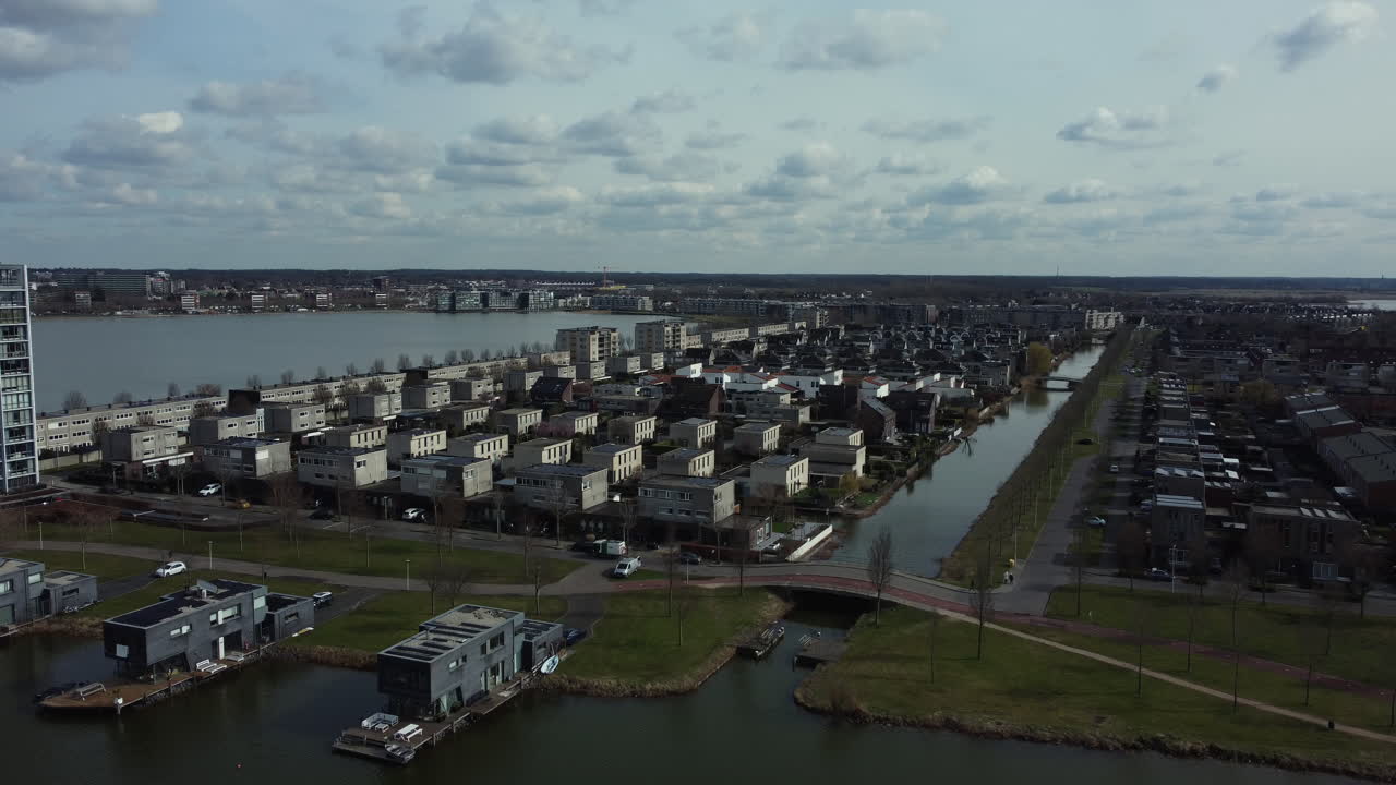 Aerial View of a Dutch Town with Canals and Houses