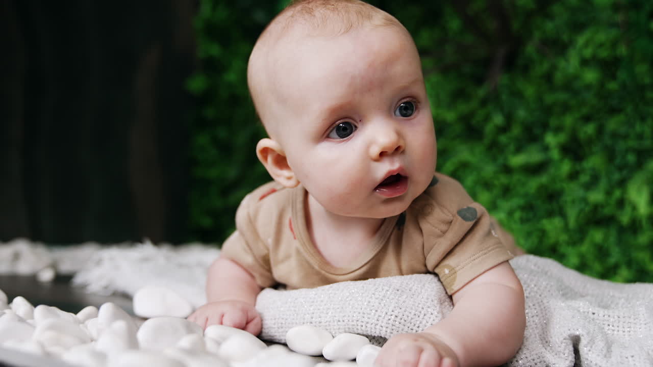 Baby Girl Lying on Blanket