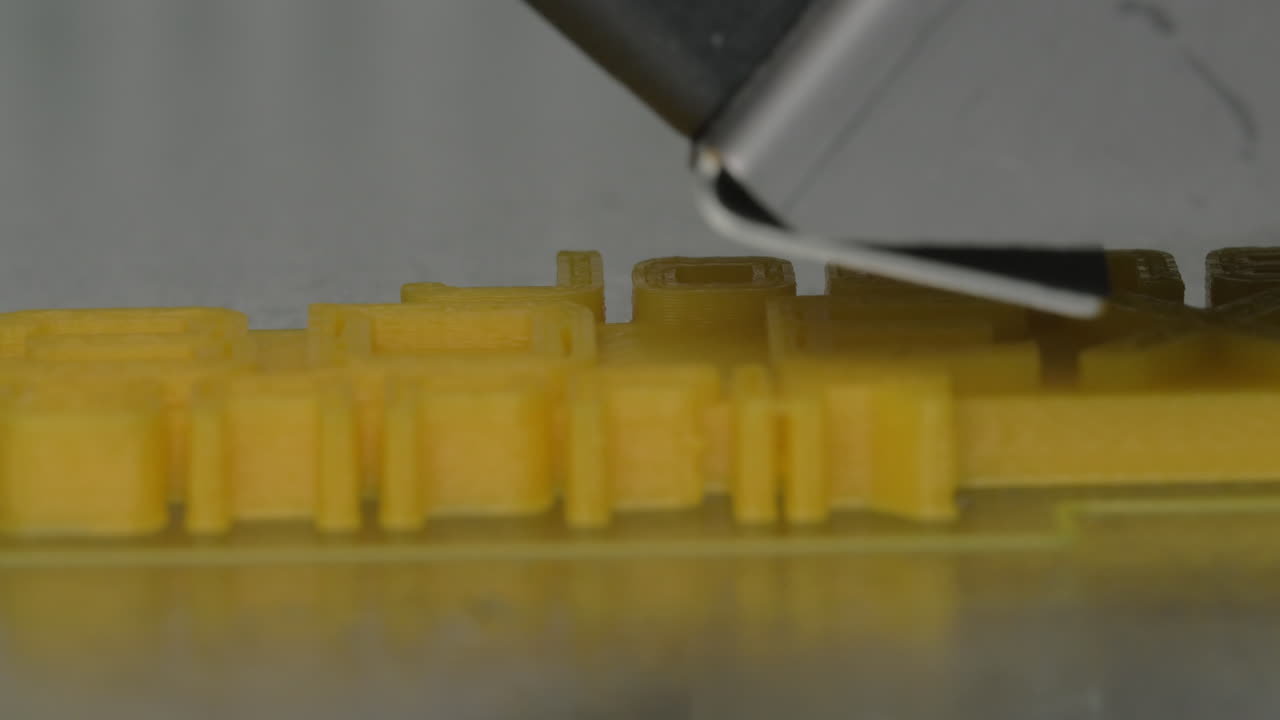 Close up view of printing plastic model on a 3D printer in process