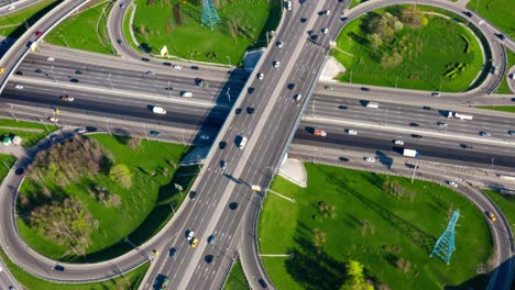 timelapse aerial view of a freeway intersection traffic trails in moscow.