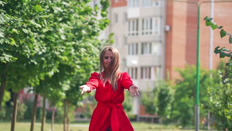 woman walking on city street. portrait young attractive smile woman look at camera at city