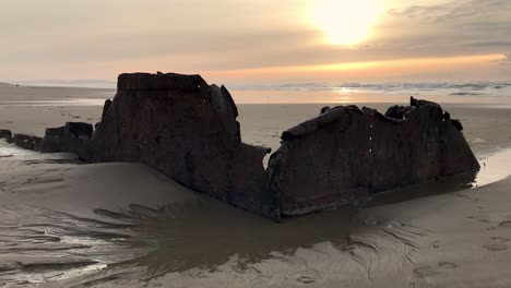 a piece of the sujameco shipwreck exposed during low tide at horsfall beach near coos bay, oregon