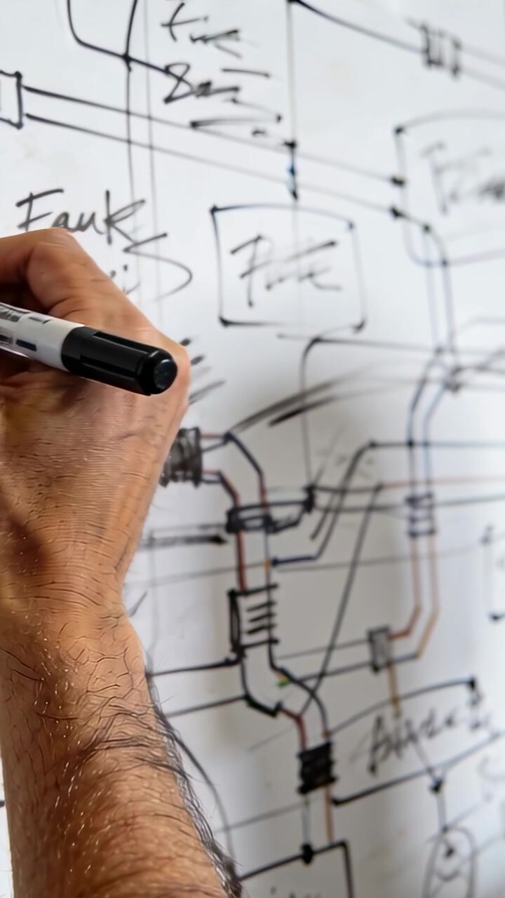 Vertical video: Entering bare arm tracing lines, noting with marker on board for review, copy space