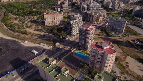 Aerial-Establisher-Over-City-Buildings-And-Resorts-In-San-Juan,-Spain