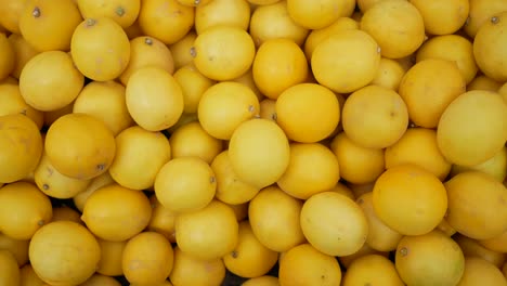 a close-up of a pile of lemons