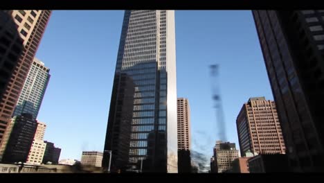 journey through the vibrant streets of downtown houston as afternoon sun illuminates skyscrapers and city life unfolds. experience the essence of urban exploration in texas.