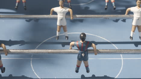 a close up of a vintage table football game